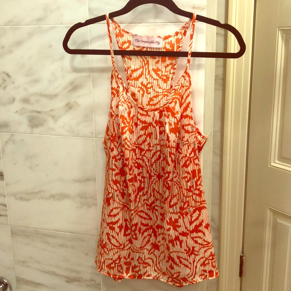 The Impeccable Pig top
